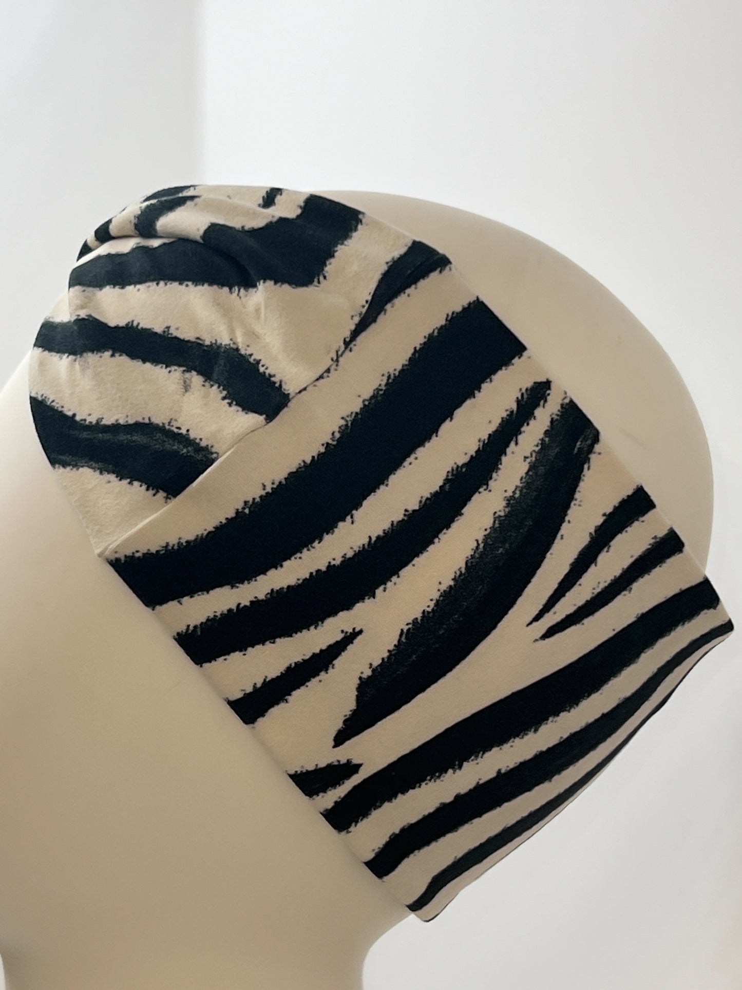 White with black lines headband.