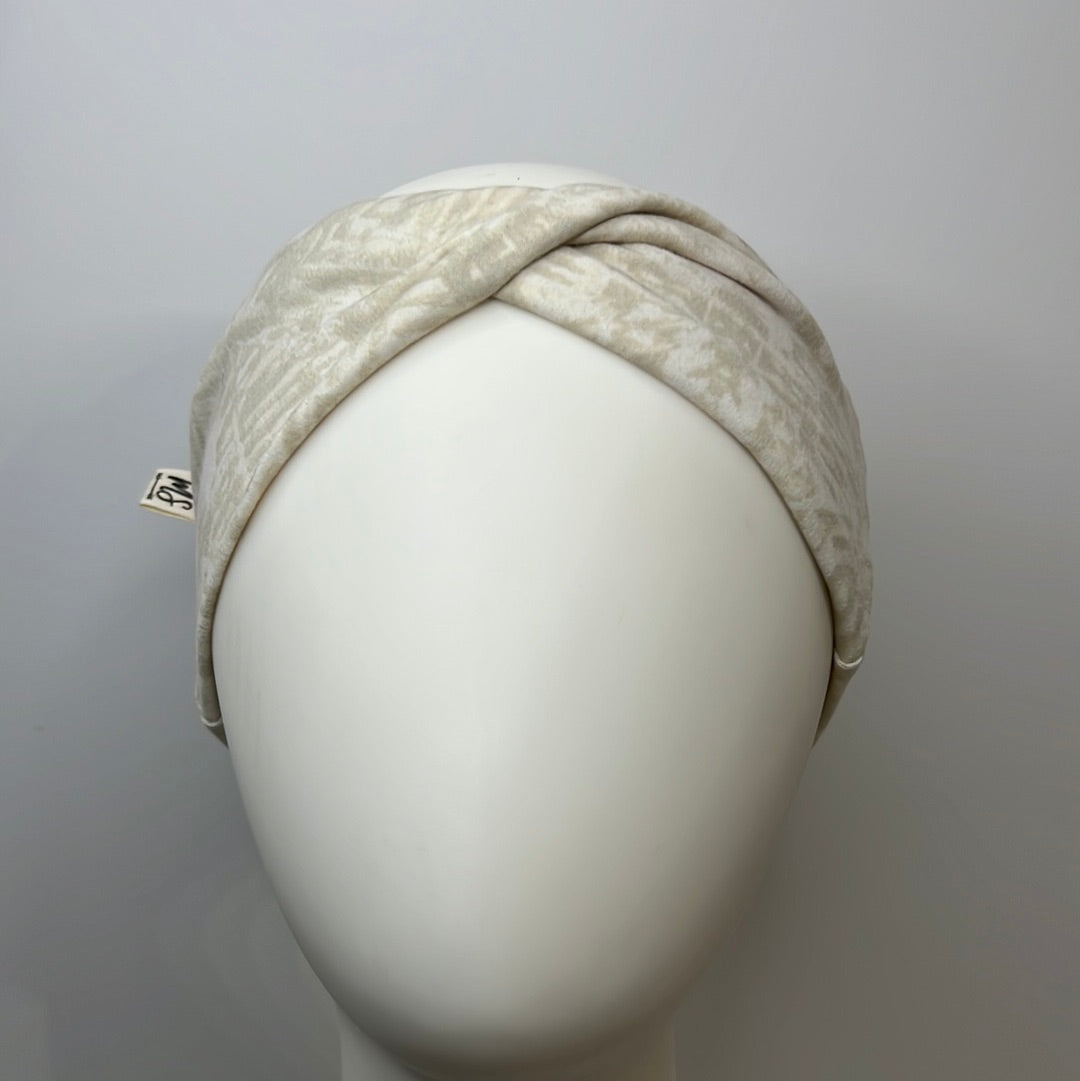 Light Beige with white headband.