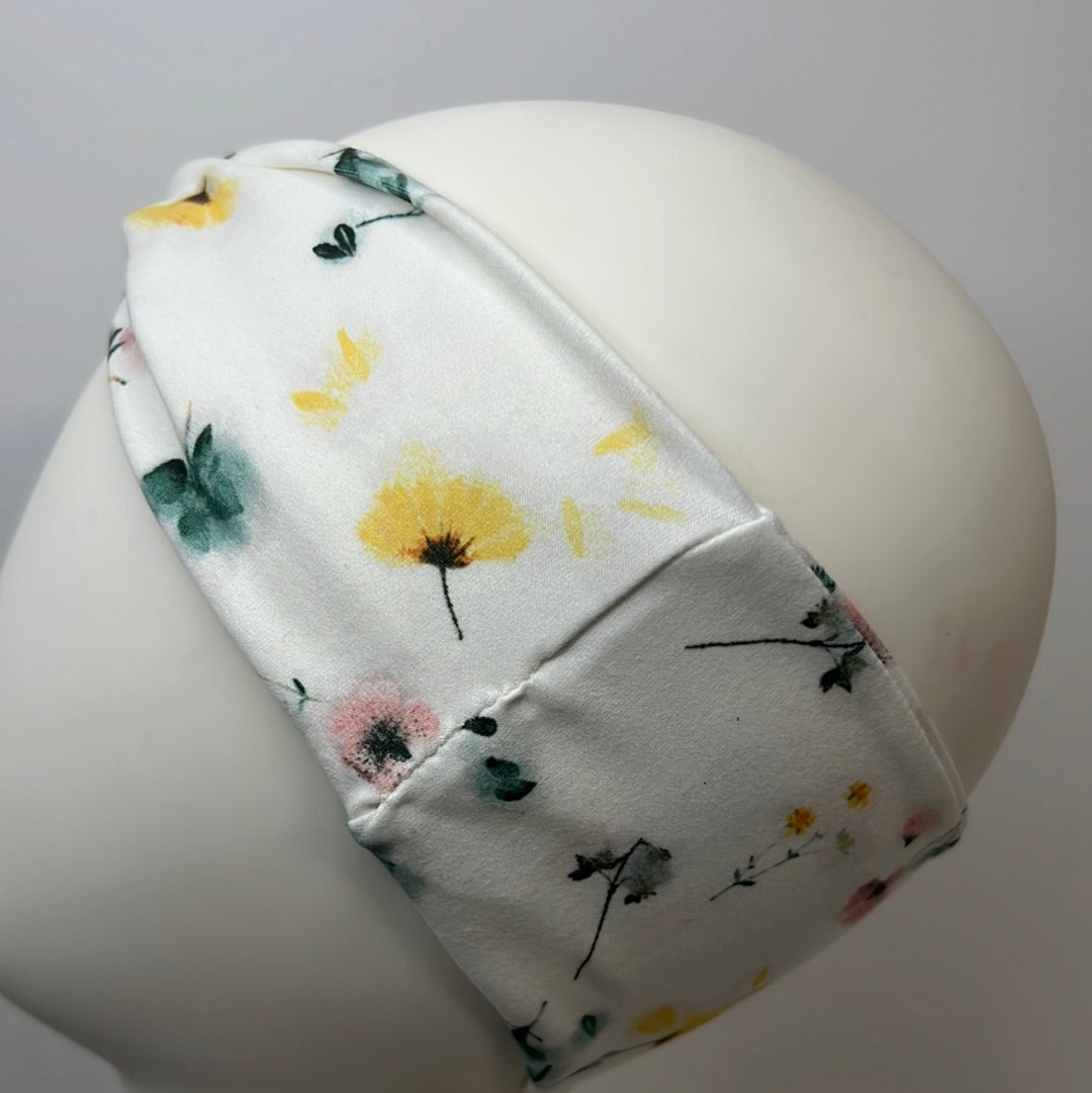 White with flowers headband.