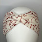 White with red dots headband.