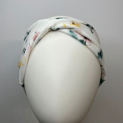 White with flowers headband.